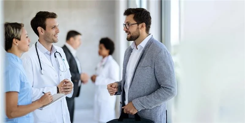 RevTechSquare professional medical billing team collaborating in a modern office